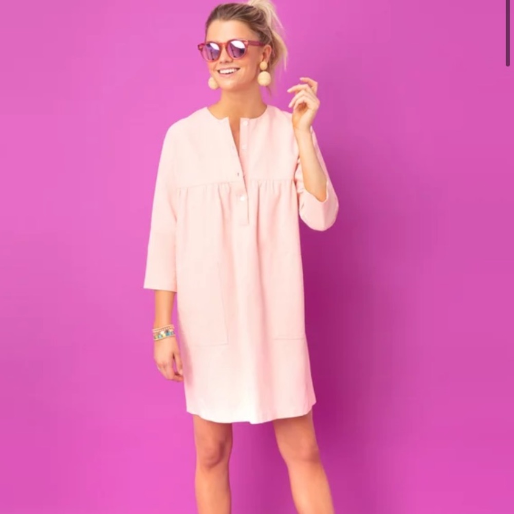 Used-like new condition. Wore one time to a bridal shower. Peach Fallon Dress